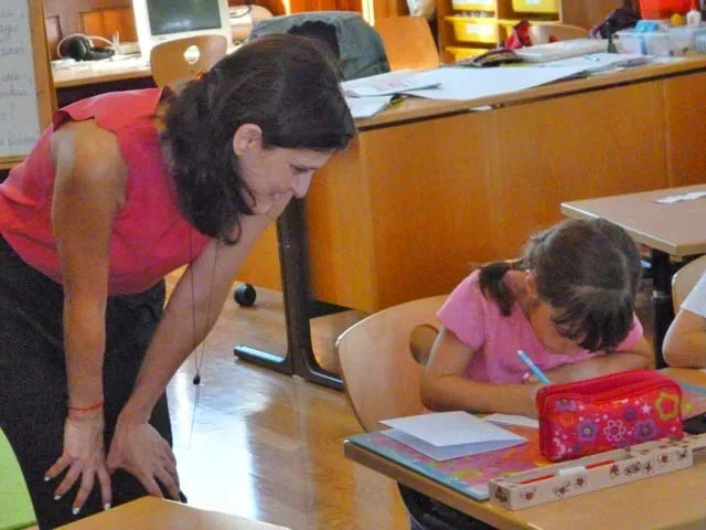 Denitza Mineva helping a pupil