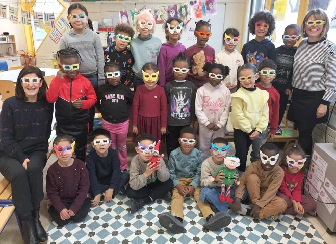 A class wearing their happiness glasses